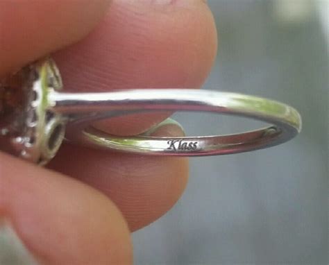 jewelry stamped inside rings.